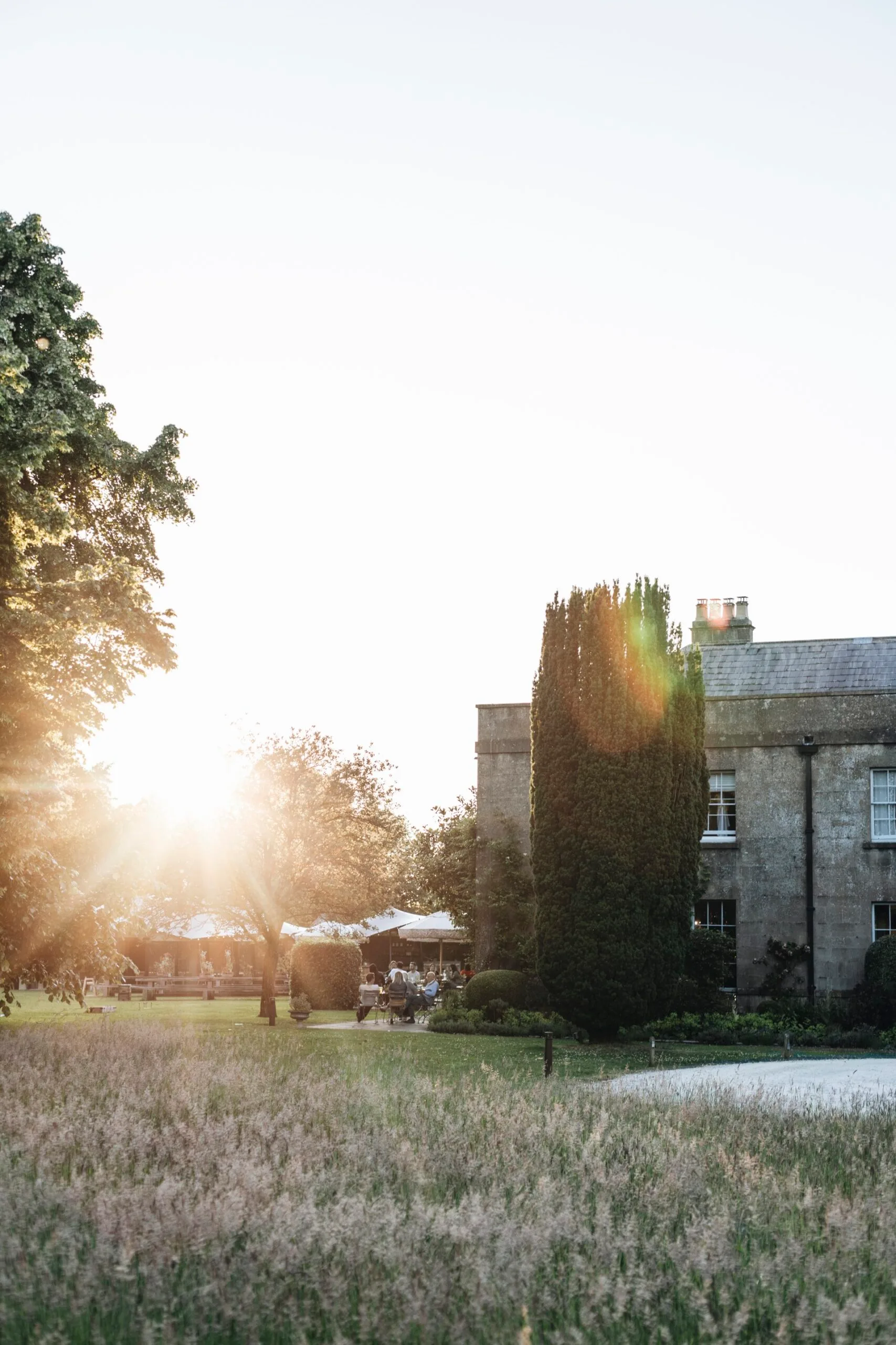 Sun casting light upon The Pig Near Bath boutique stay