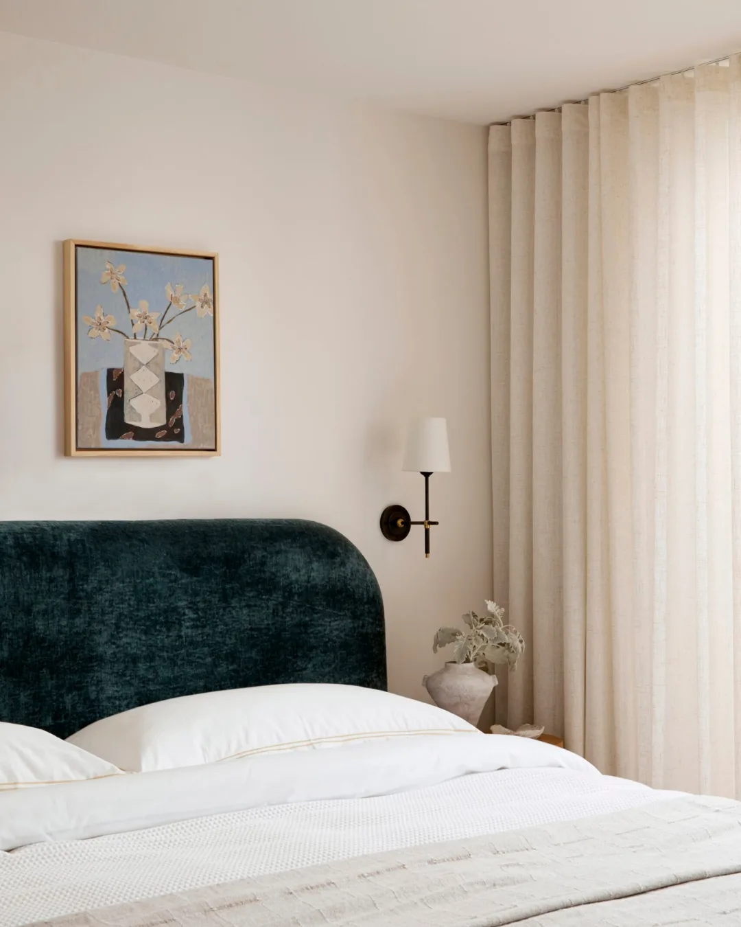 a cooling pillow on a velvet green bed in a beach home