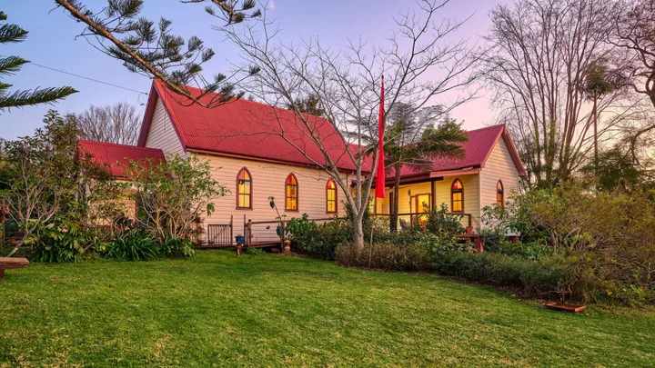 A red-roofed church in Comboyne