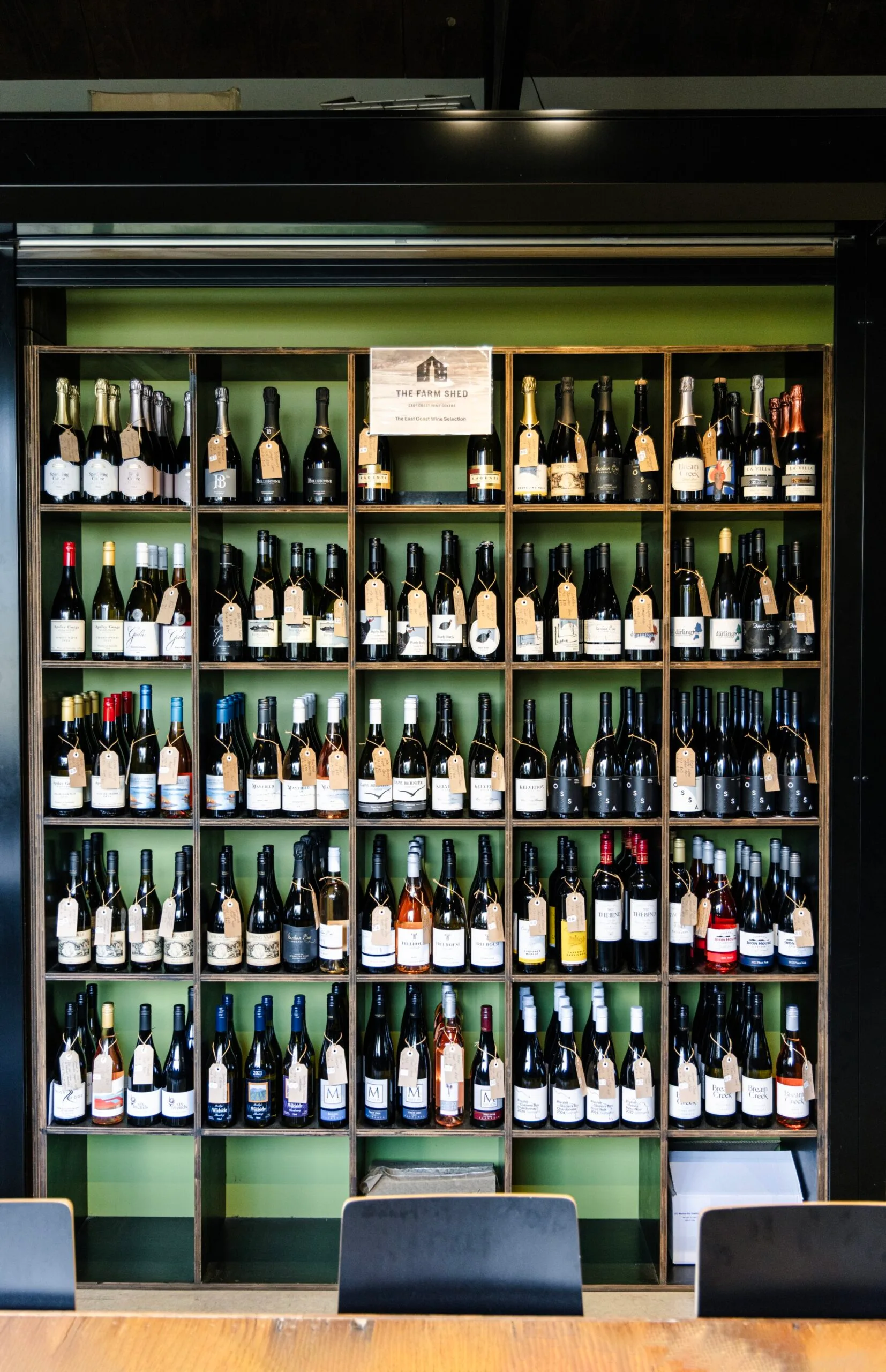 Shelves of wine at The Farm Shed, Bicheno