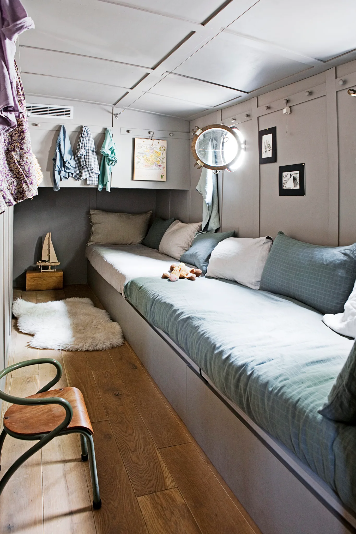 A Houseboat Afloat On A Parisian Canal