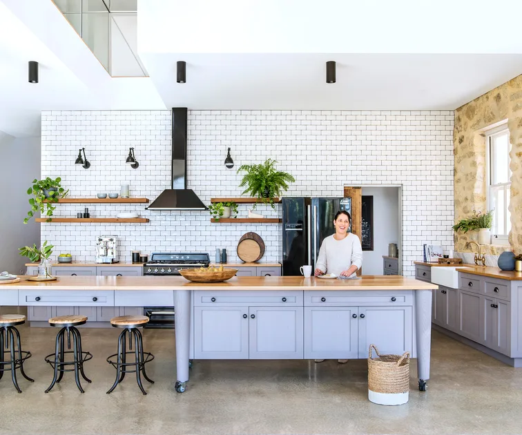 Inside an open plan country kitchen where texture takes centre stage