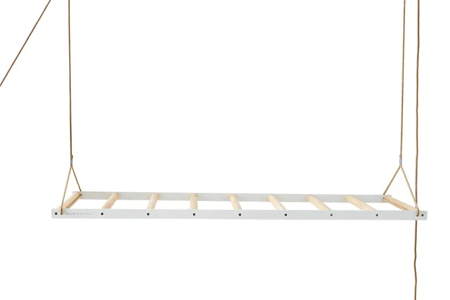 Hanging wooden drying rack with ropes, designed by George & Willy.