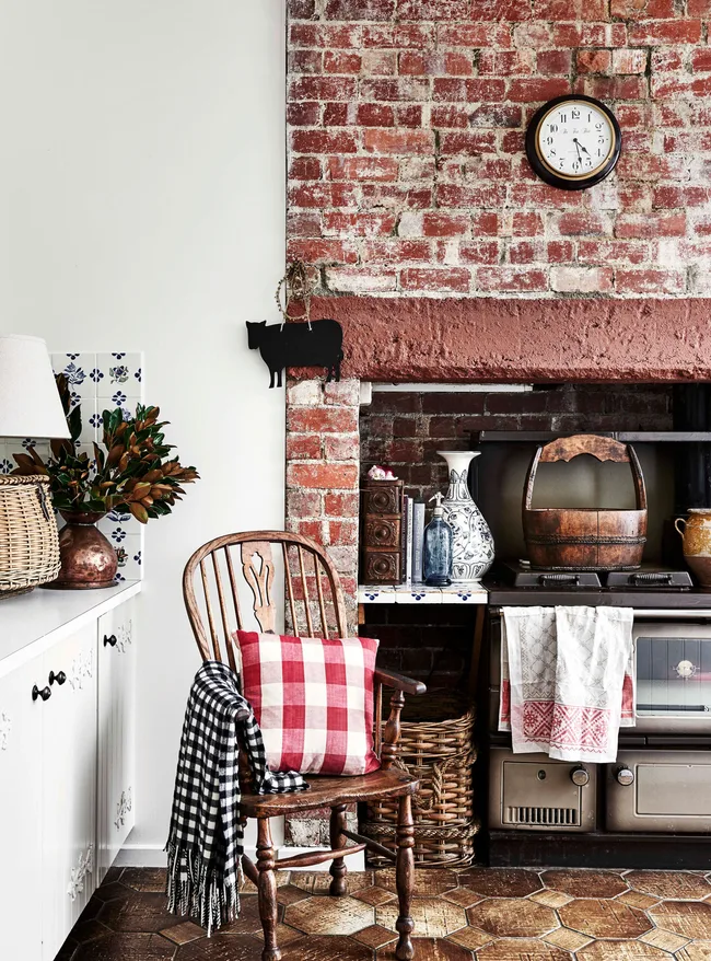 A country kitchen with a brick-encased stove