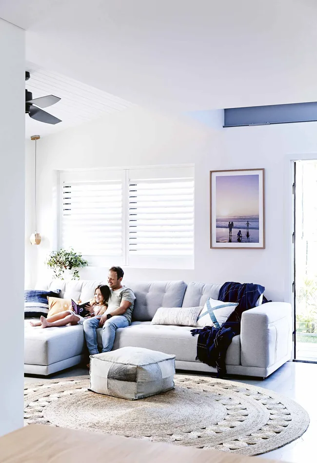 Modern design meets family living in this beachside beauty