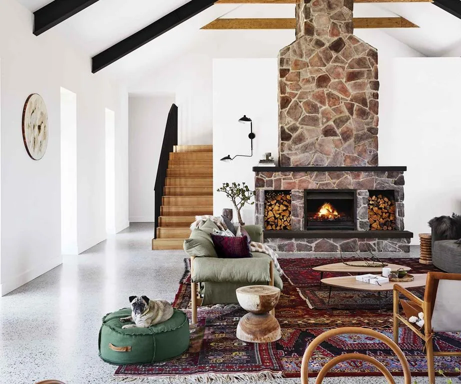 Double-sided fireplace in a country style kitchen