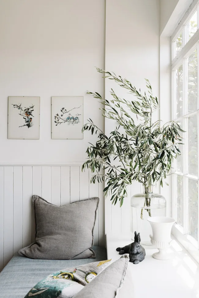 A window seat with cushions