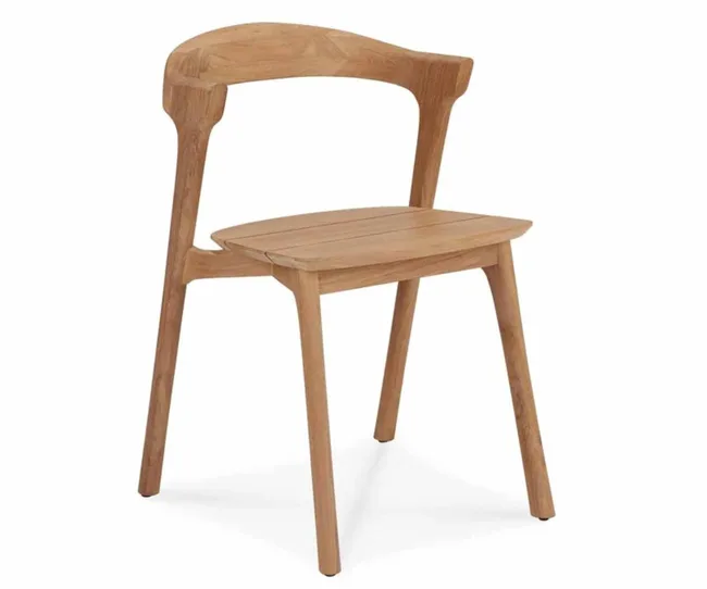 Wooden chair with a curved backrest and four angled legs.