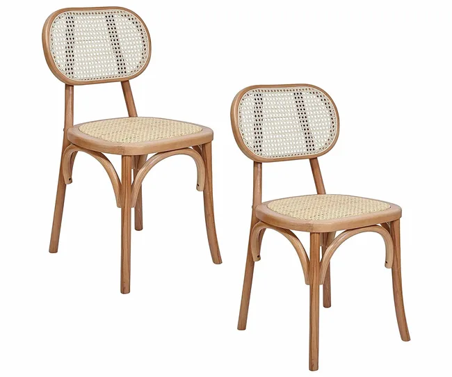 Two wooden chairs with cane seats and backrests, featuring a light natural finish, placed side by side.