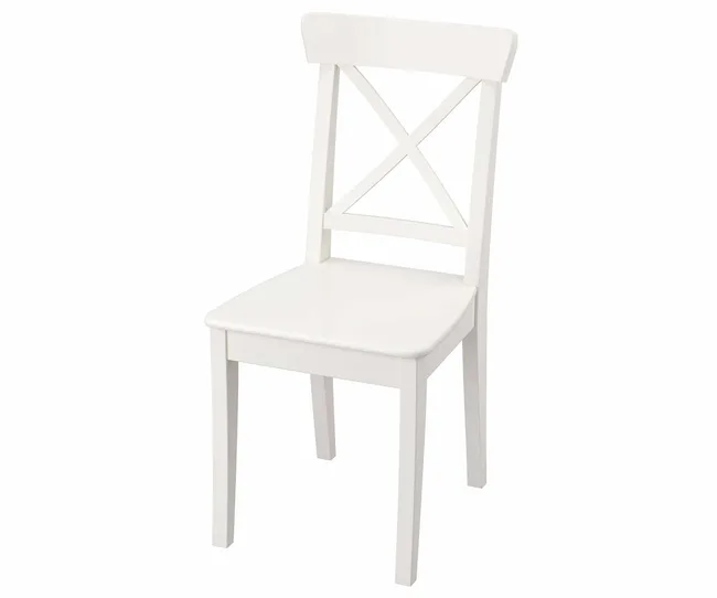 White wooden chair with an X-back design and four legs, photographed on a white background.