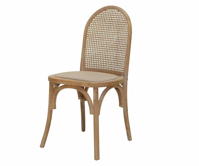 Wooden chair with a curved backrest and woven rattan design, featuring a cushioned seat.