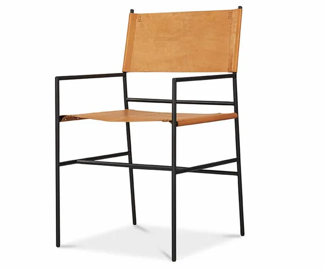 Chair with black metal frame and brown leather seat and backrest, designed in a minimalist style.