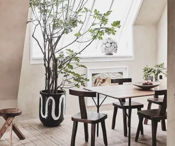 A sophisticated studio apartment with a restrained palette