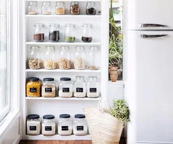 Organised pantry with glass jars