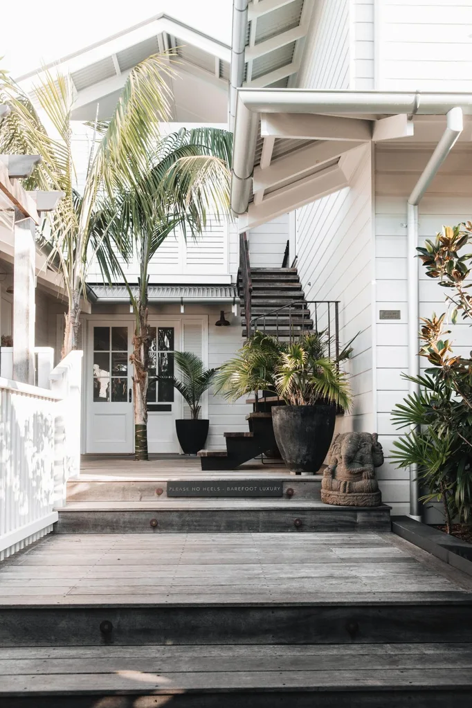 The white weatherboard exterior of 28 Degrees