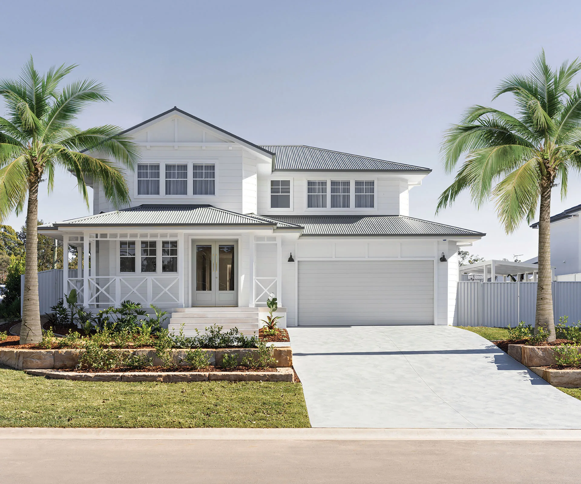 coastal-inspired home exterior with palm trees