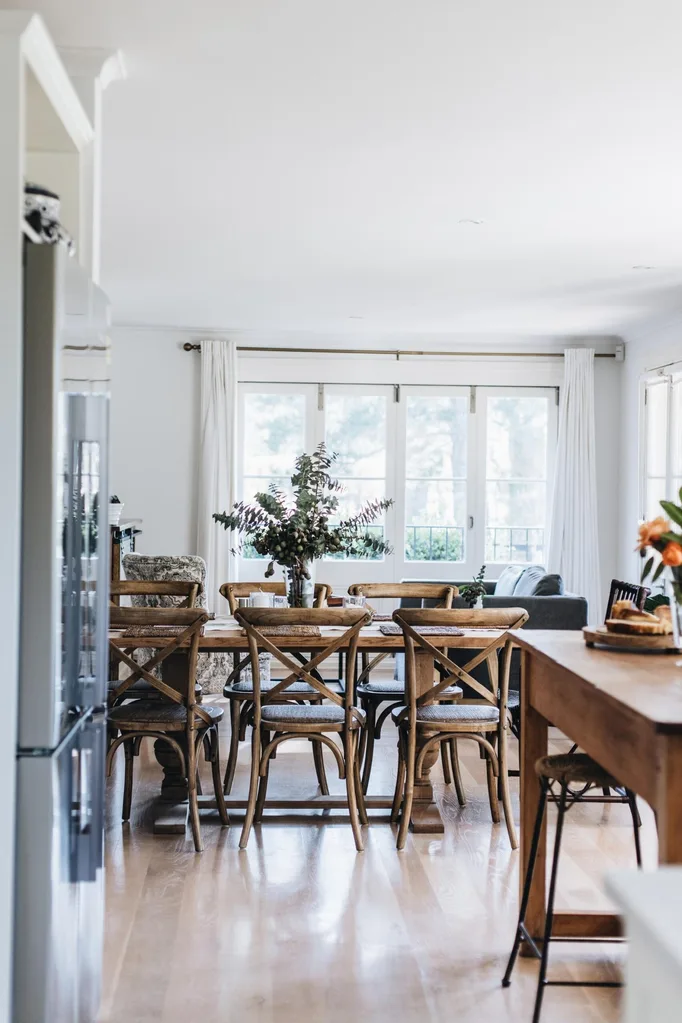 country style dining area with timber table and timber chairs