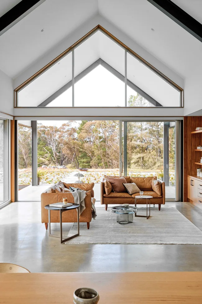 https://api.photon.aremedia.net.au/wp-content/uploads/sites/9/homes/2022/12/05/1670201722417_contemporary-country-living-room-scaled.jpg?fit=650%2C975&resize=650%2C975