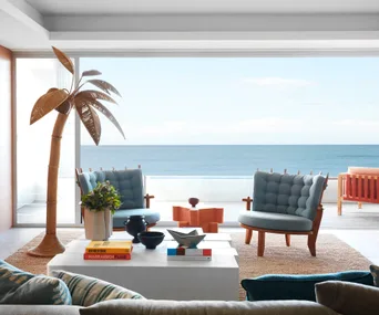 A whimsical waterfront home with a unique colourful coastal aesthetic