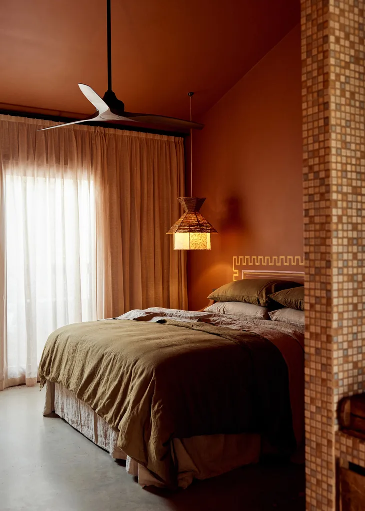 Byron Bay accommodation: A terracotta-coloured room at Sun Ranch