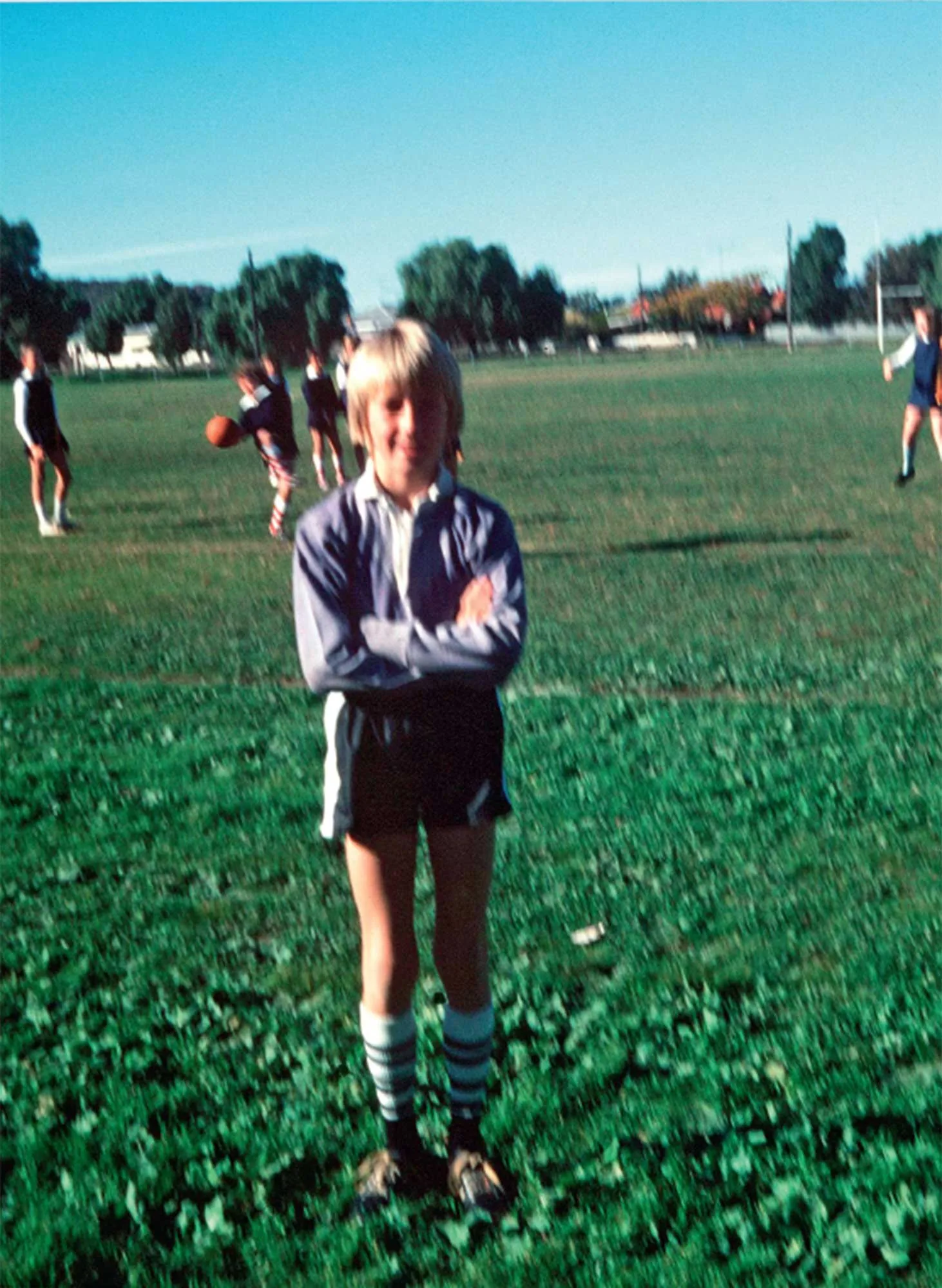 Glenn McGrath as a child on the football field