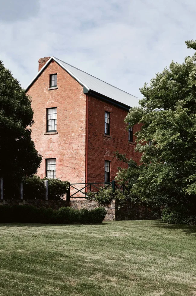 The red brick exterior of the homestead at Patterdale Farm